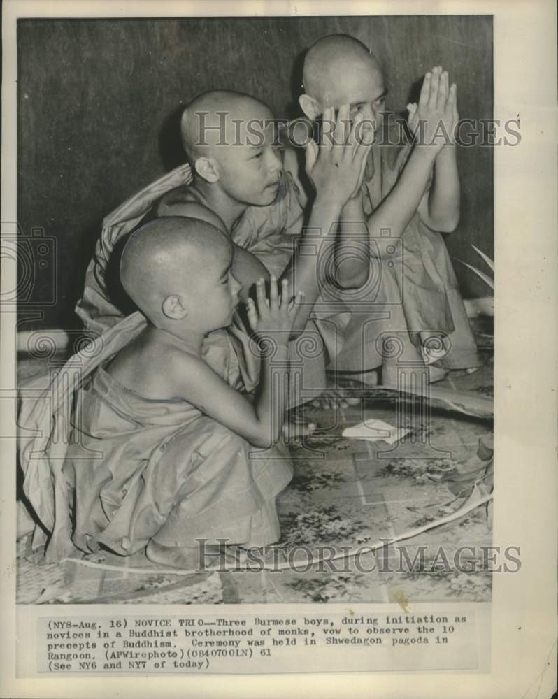 1961 Three Burmese boys vow to observe the 10 precepts of Buddhism - Historic Images