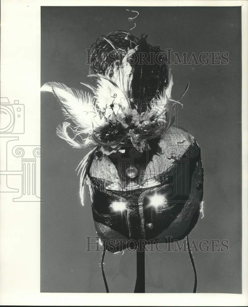 198 The mask of a "deva" -- a far-eastern flower fairy - Historic Images