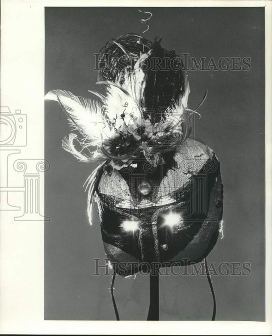 198 The mask of a "deva" -- a far-eastern flower fairy - Historic Images