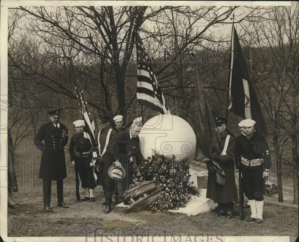 1930 Sect. Jahncke places a wreath at the tomb of Rear Adm. Peary - Historic Images