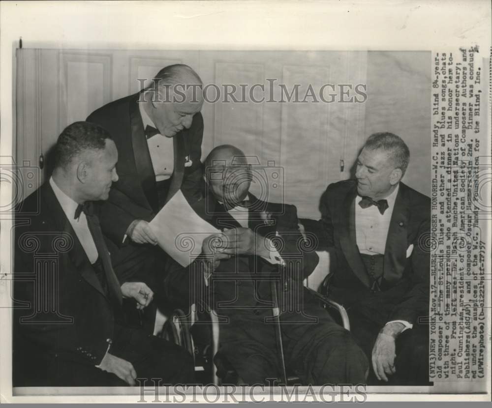 1957 Blind jazz composer WC Handy attends dinner in his honor - Historic Images