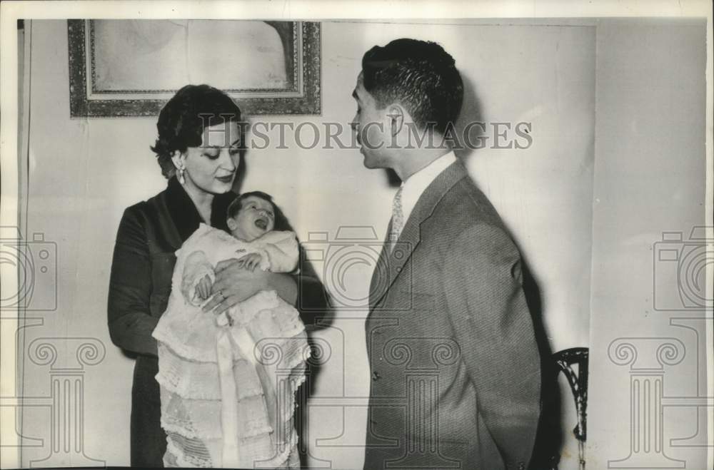 1956 King Hussein of Jordan Listens to One Month Daughter Aaliyah - Historic Images