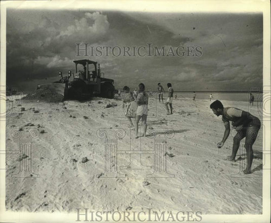 1977 People on beach in Miami Beach, FL - Historic Images
