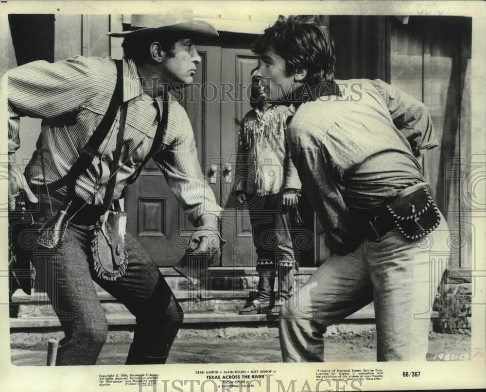 1966 Dean Martin and Alain Delon Star In &quot;Texas Across The River&quot; - Historic Images