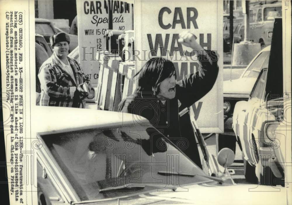 1974 Frustrated motorist&#39;s reaction in Chicago Gas Station - Historic Images