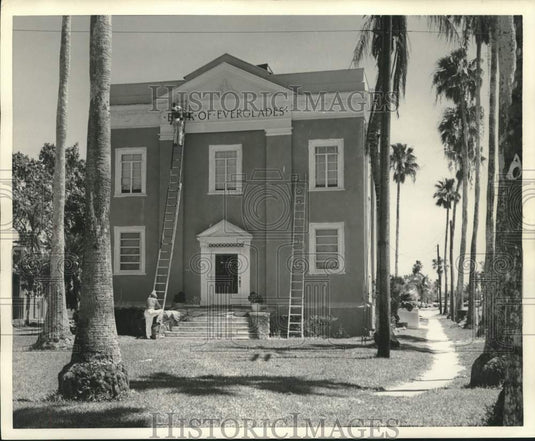1961 Repaint works at the Bank of Everglades after Hurricane Donna-Historic Images