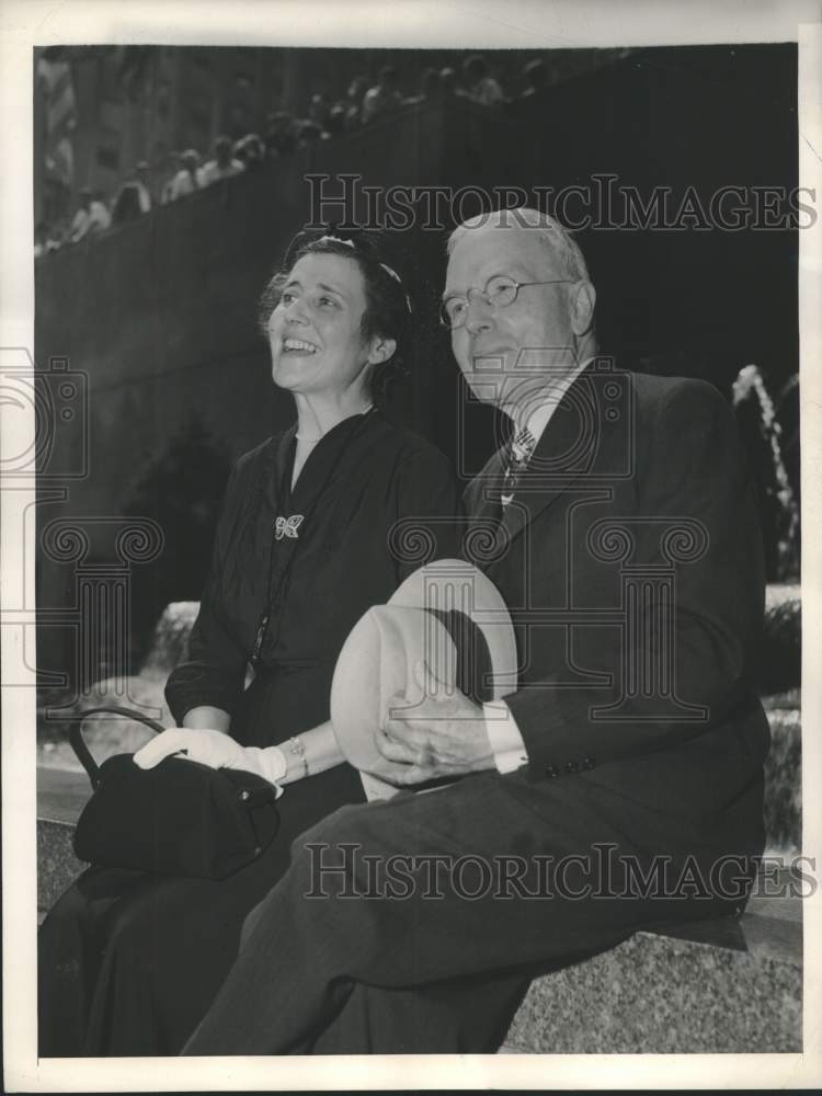 1952 John Rockefeller Jr. and wife relax at Rockefeller Plaza - Historic Images