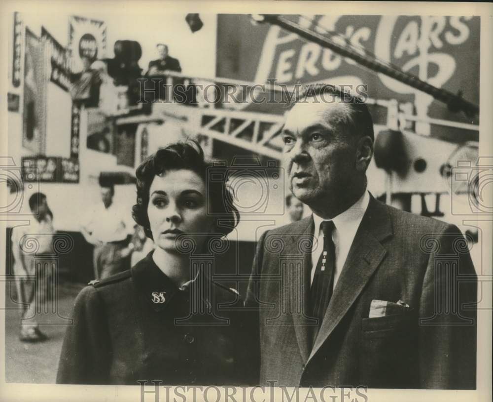 1957 Carroll Righter shown with actress Jean Simmons - Historic Images