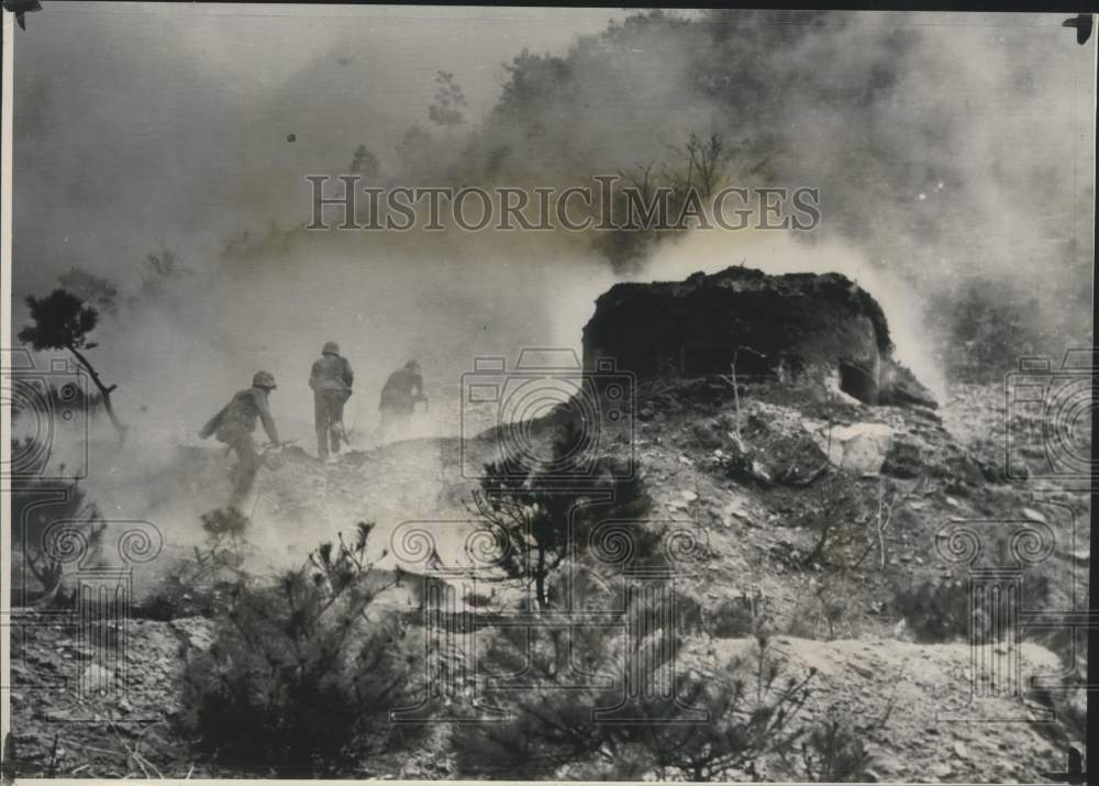 1951 American Marines move past Communist bunker somewhere in Korea - Historic Images