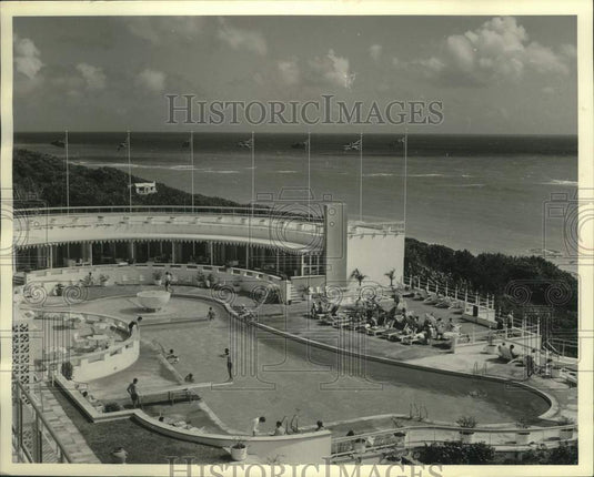 1968 Elbow Surf Club's pool and sunbathing area in Bermuda - Historic Images