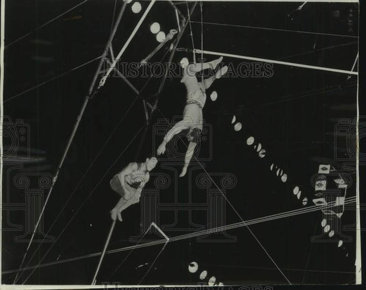 1955 Press Photo Aerialists Perform with Barnum & Bailey Circus, Boston - Historic Images