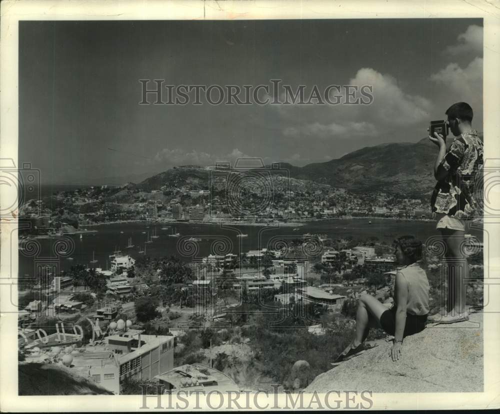 1961 Couple View &amp; Photograph Famous Harbor at Acapulco Mexico-Historic Images