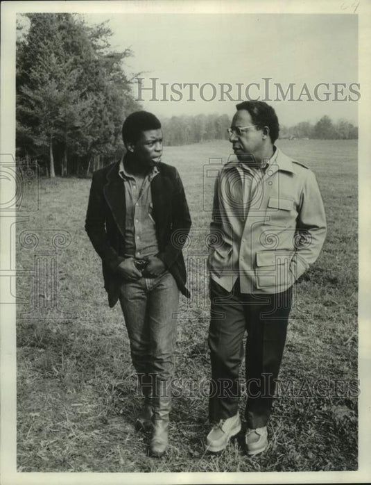 1978 Actor LeVar Burton talks with "Roots" author Alex Haley - Historic Images