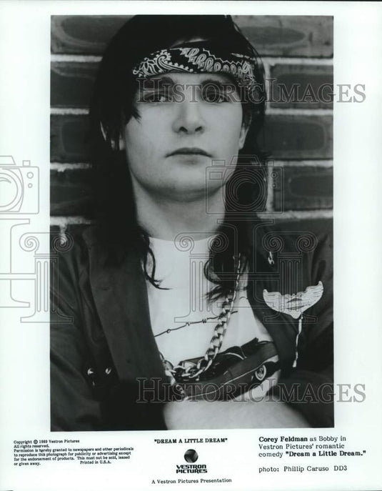 1989 Corey Feldman stars in the comedy "Dream a Little Dream" - Historic Images