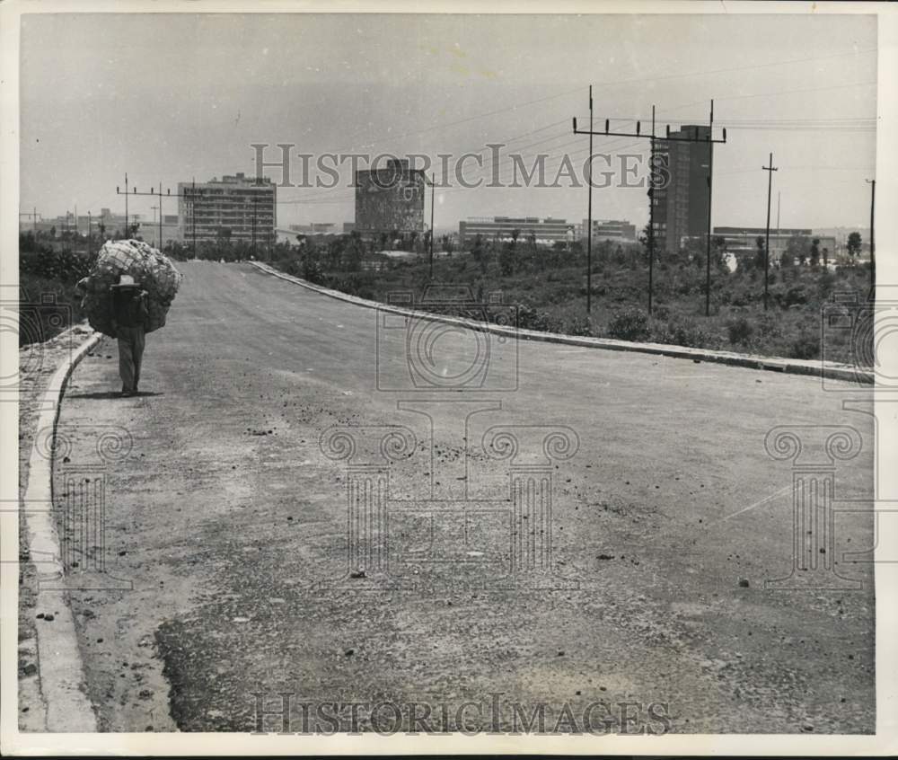 1953 Indian Carries Heavy Load Along Mexico&#39;s Modern Highway-Historic Images