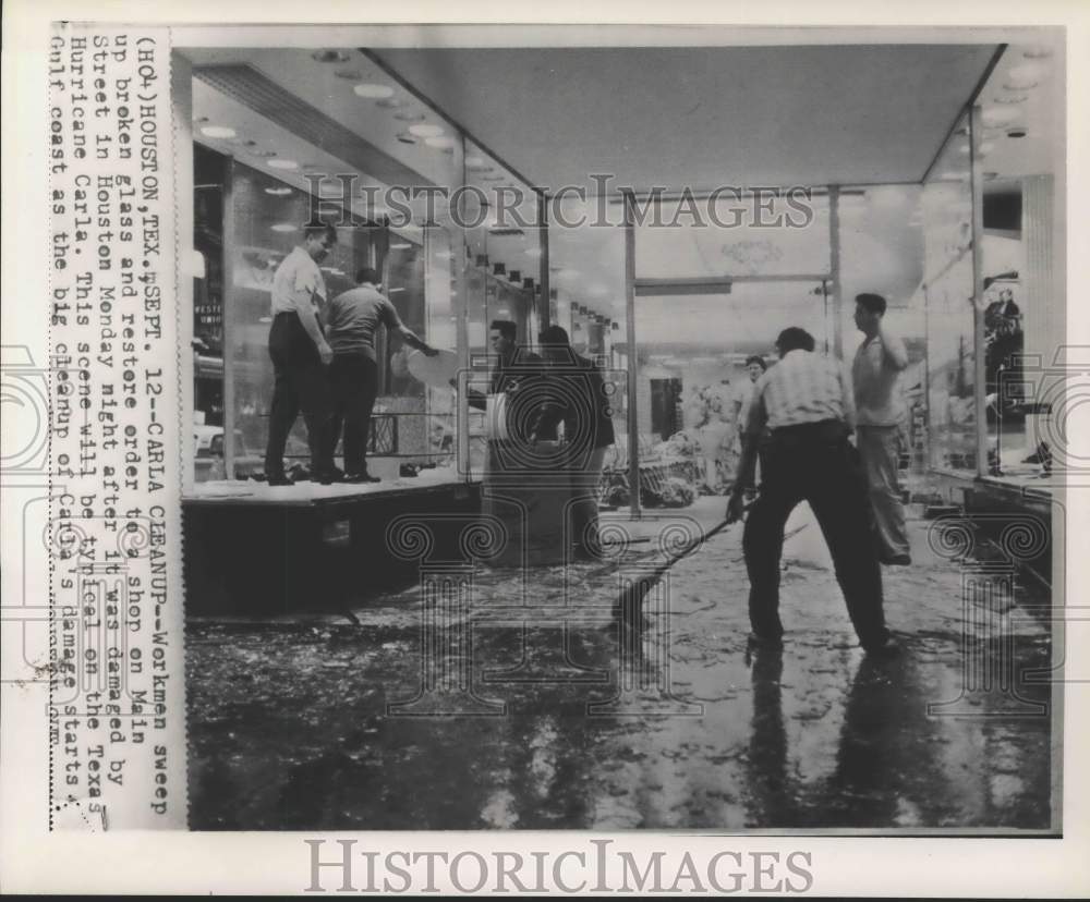 1961 Workers clean up Houston store damaged by Hurricane Carla-Historic Images