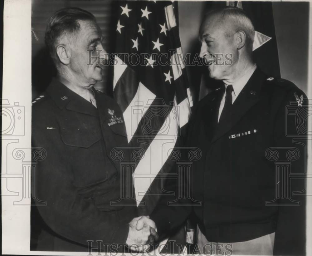 1946 Army Gen Henry Arnold shakes Gen Carl Spaatz&#39;s hand - Historic Images