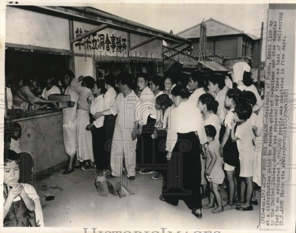 1953 Pusan, Korea residents receiving donations from United States-Historic Images