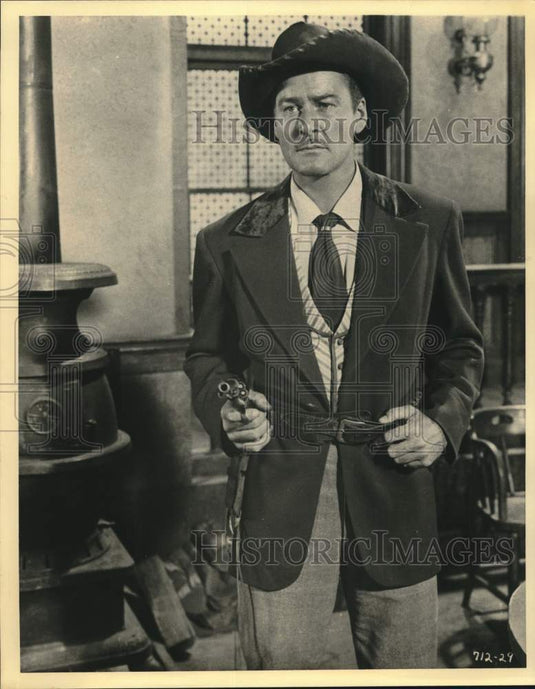 1950 Press Photo Actor Errol Flynn stars in a scene from "Montana" - lrx72870- Historic Images