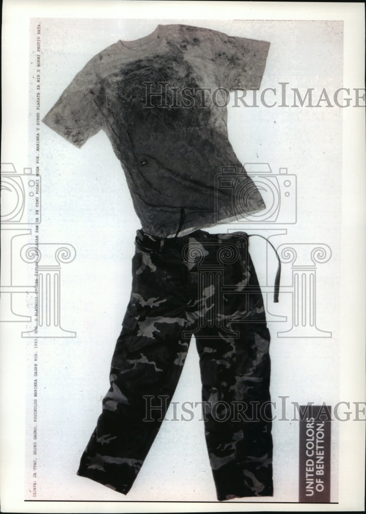 1994 Press Photo Blood stained shirt worn by soldier killed in Bosnia- Bennetton - Historic Images