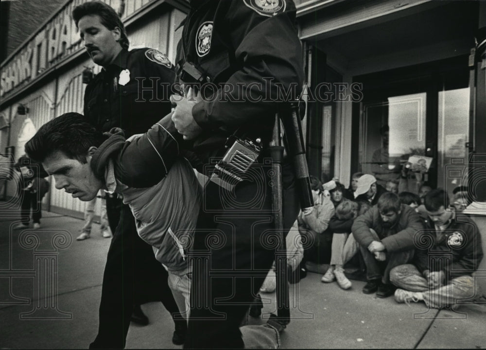 1990 Press Photo Abortion protesters are arrested and led away - mja01786 - Historic Images