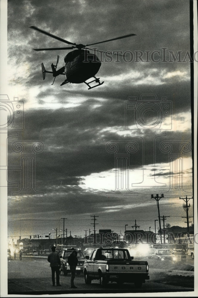 1991 Press Photo The flight for Life Helicopter transporting Dennis Baus to hosp-Historic Images