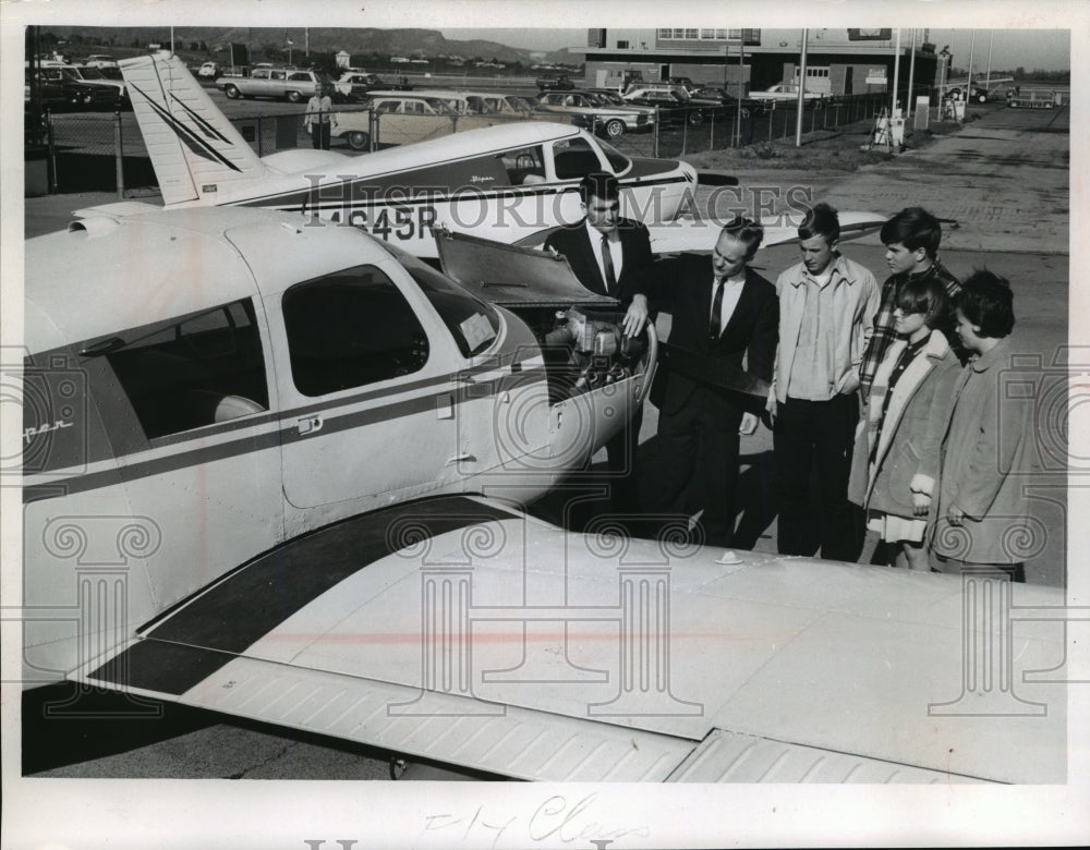 1966 Checking out a plane in the Onalaska aviation course - Historic Images