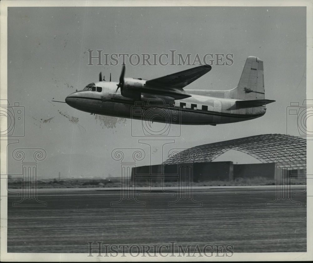 Press Photo Aircraft in mid flight - mja03886 - Historic Images