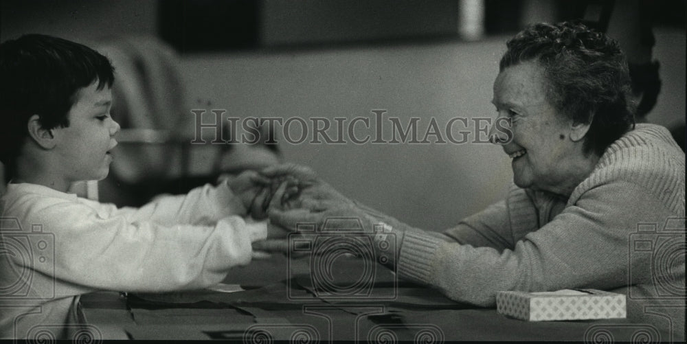 1989 Press Photo Danny Kasper playing with Charlotte Diesenreiter - mja04555 - Historic Images