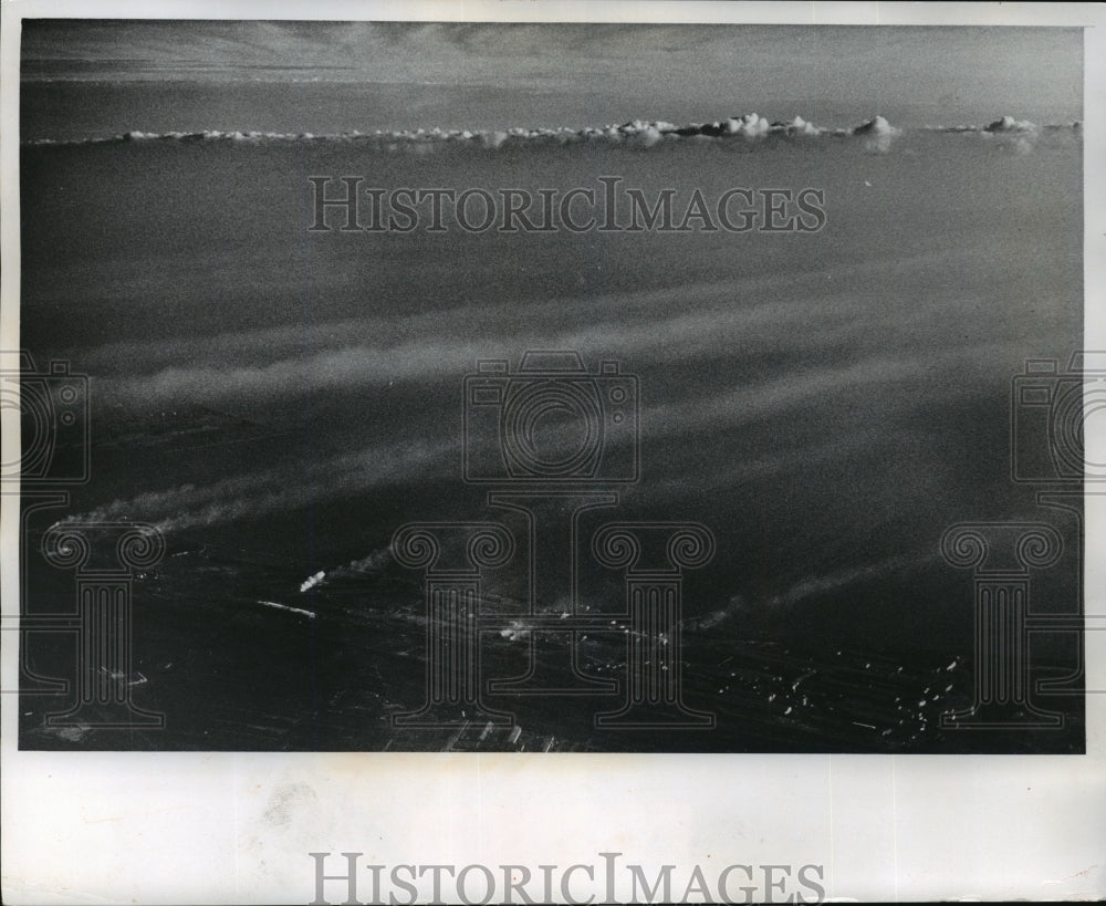 1973 Press Photo Plumes of red iron oxide smoke drifting north - mja06539 - Historic Images