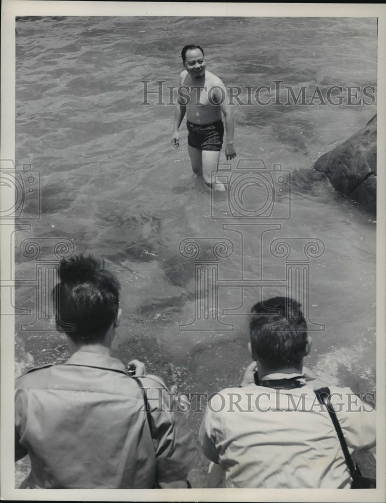 1964 Viet Nam's Strongman Major General Nguyen Khanh takes a dip - Historic Images