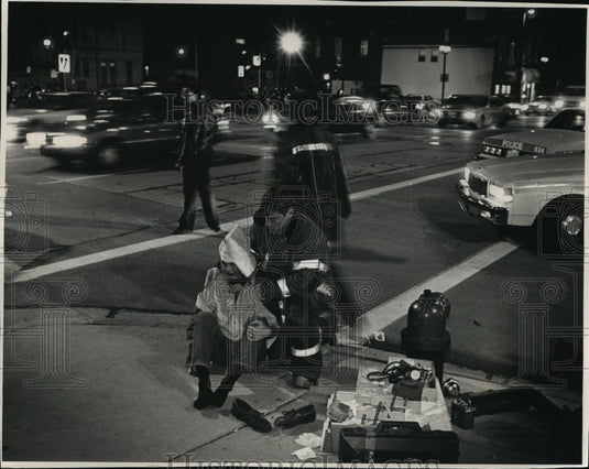 1991 Press Photo Firefighter Console Dae Fritschler Struck by a Car - mja07637 - Historic Images