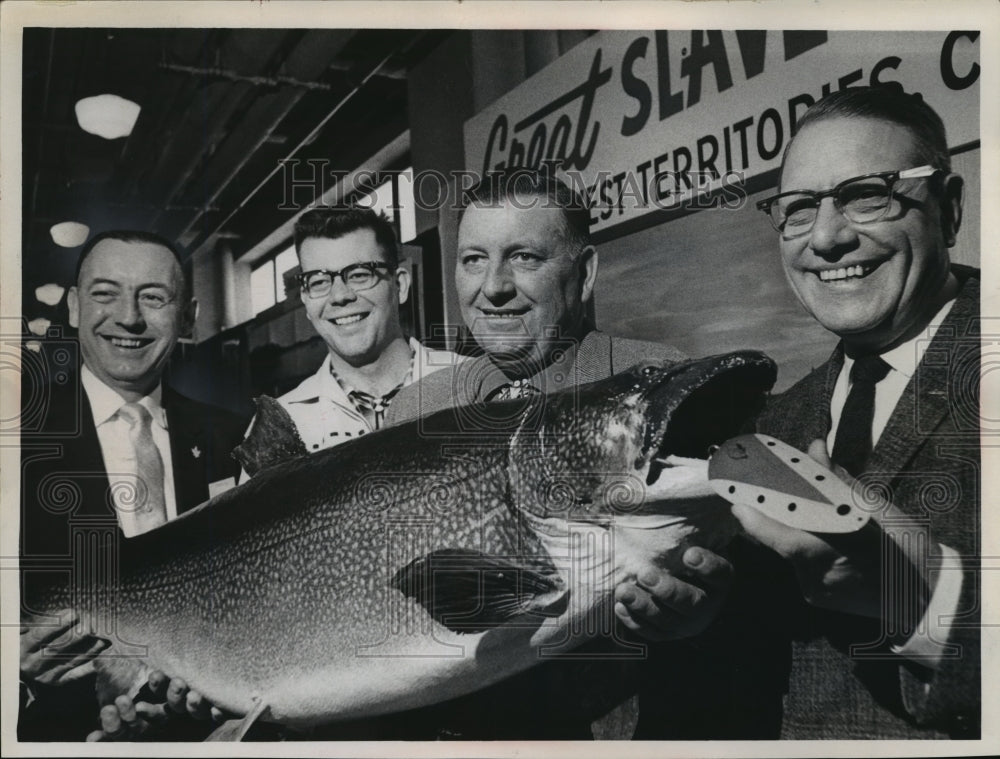 1965 Press Photo Orin Benson landed a 35lb. lake trout fishing - mja08562- Historic Images