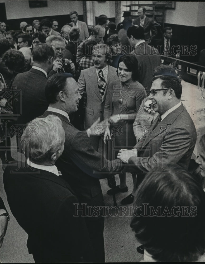 1974 Press Photo Robert W Warren, Milwaukee Federal Judge congratulated-Historic Images