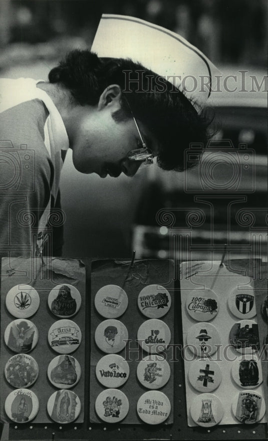 1983 Press Photo Buttons with Spanish flavor for sale at the market - mja15727 - Historic Images