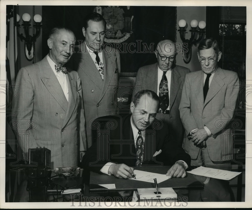 1951 Press Photo Governor Walter Kohler signs a new law - mja15769 - Historic Images