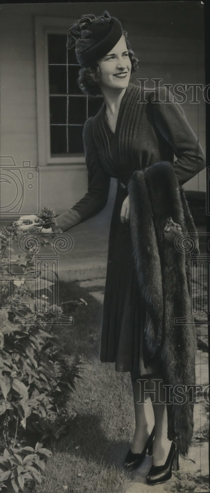 1933 Mrs. Henry Furlong modeled wine plaited wool dress  - Historic Images