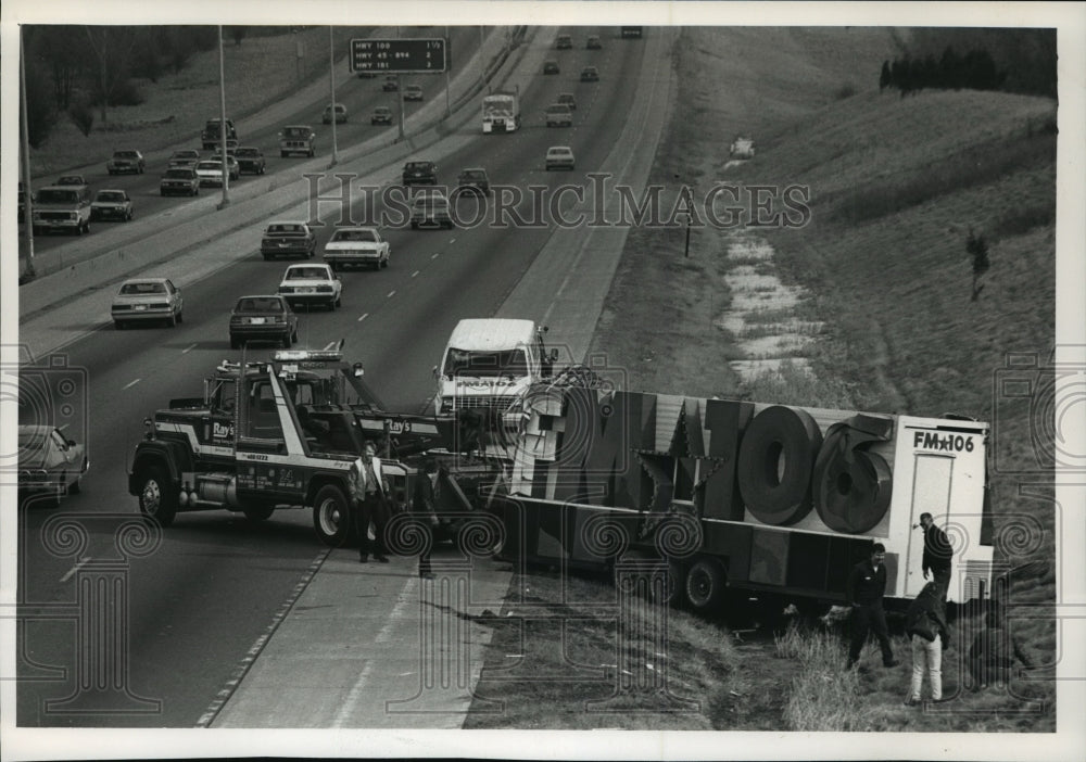 1989 Press Photo WMIL-FM Broadcast Unit and Van Flipped over in I-94 - mja19892 - Historic Images