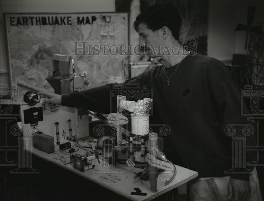 1994 Press Photo Dan Grismer Lights a Candle to Start his Experiment - mja20317 - Historic Images