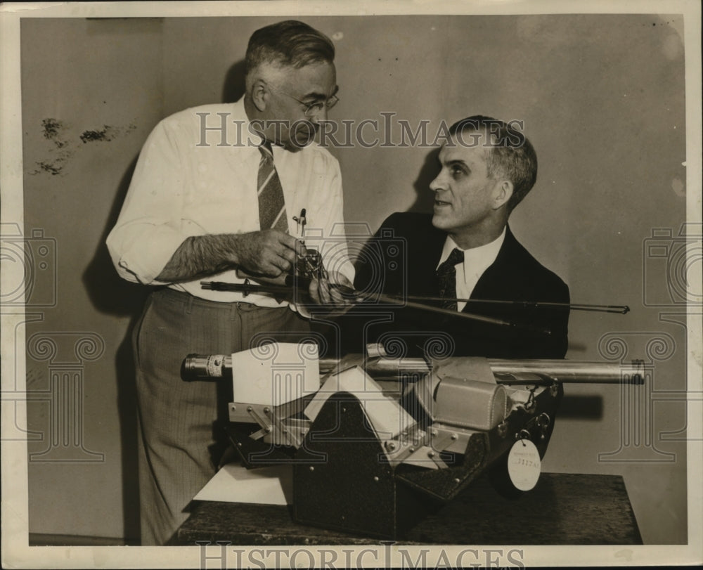 1940 Press Photo HR Budroot with Lew Morrison, pole in hand, tackle box open - Historic Images