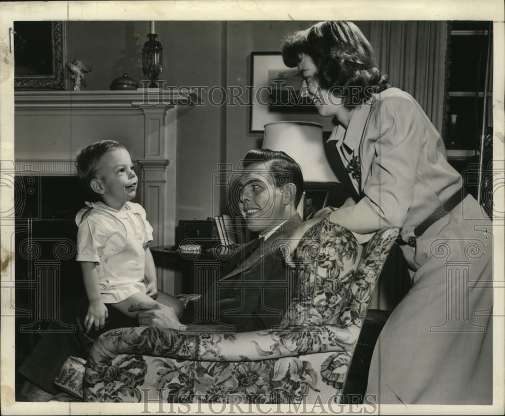 Happy Family, Son sits on fathers lap, everyone smiles-Historic Images