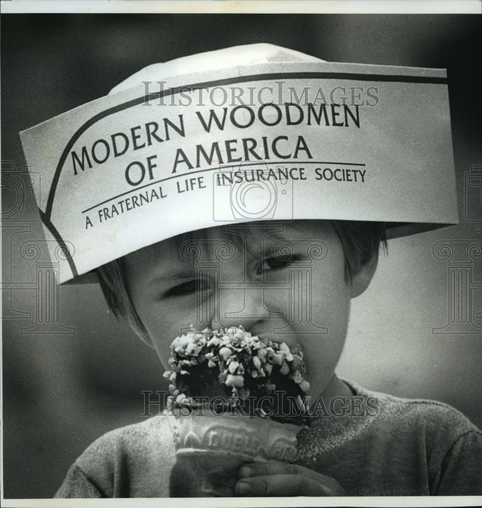 1990 Press Photo Michael Malchow, 2, munches ice cream at fair - mja24668 - Historic Images