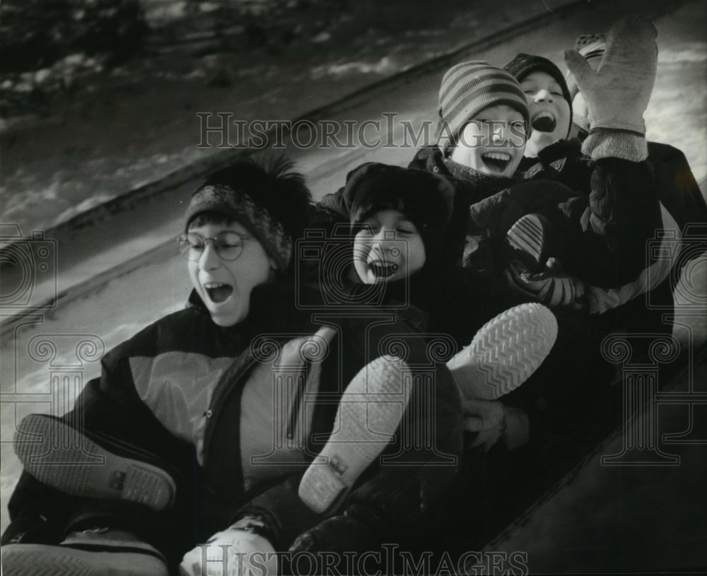 1995 Press Photo Adam Kowal enjoying the tobogan slide in Whitnall Park-Historic Images