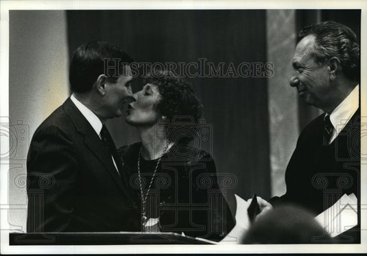 1991 Press Photo Joseph Wimmer kisses his wife after being sworn in as a judge-Historic Images