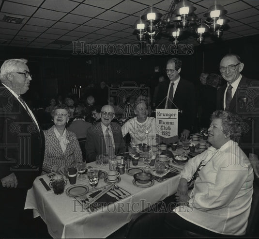 1984 Press Photo Retirees of the W.A. Krueger Company attend a Christmas party.-Historic Images