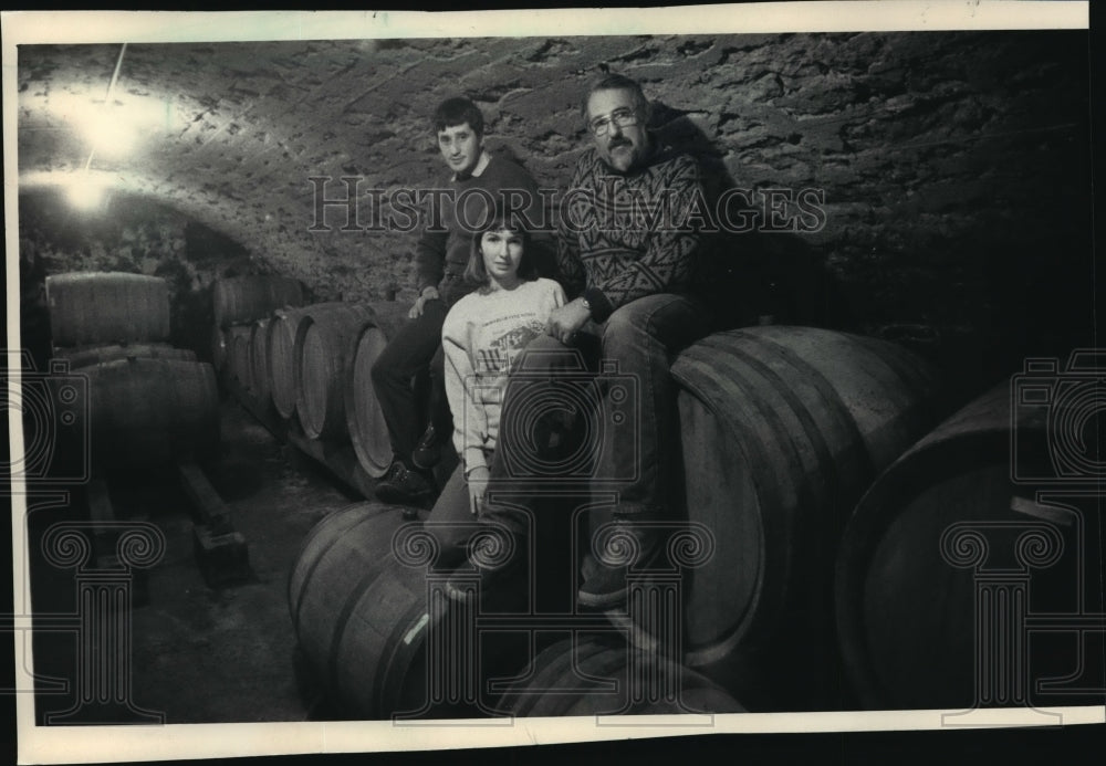 1988 Julie And Philippe Coquard And Robert Wollersheim Sit on Casks - Historic Images