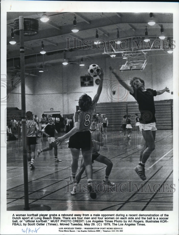 1979 Female Korfball Player Grabs Rebound From Male Opponent-Historic Images