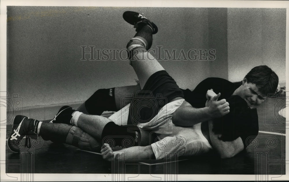 1989 Heavyweight Brian Drummy use guillotine on teammate  - Historic Images