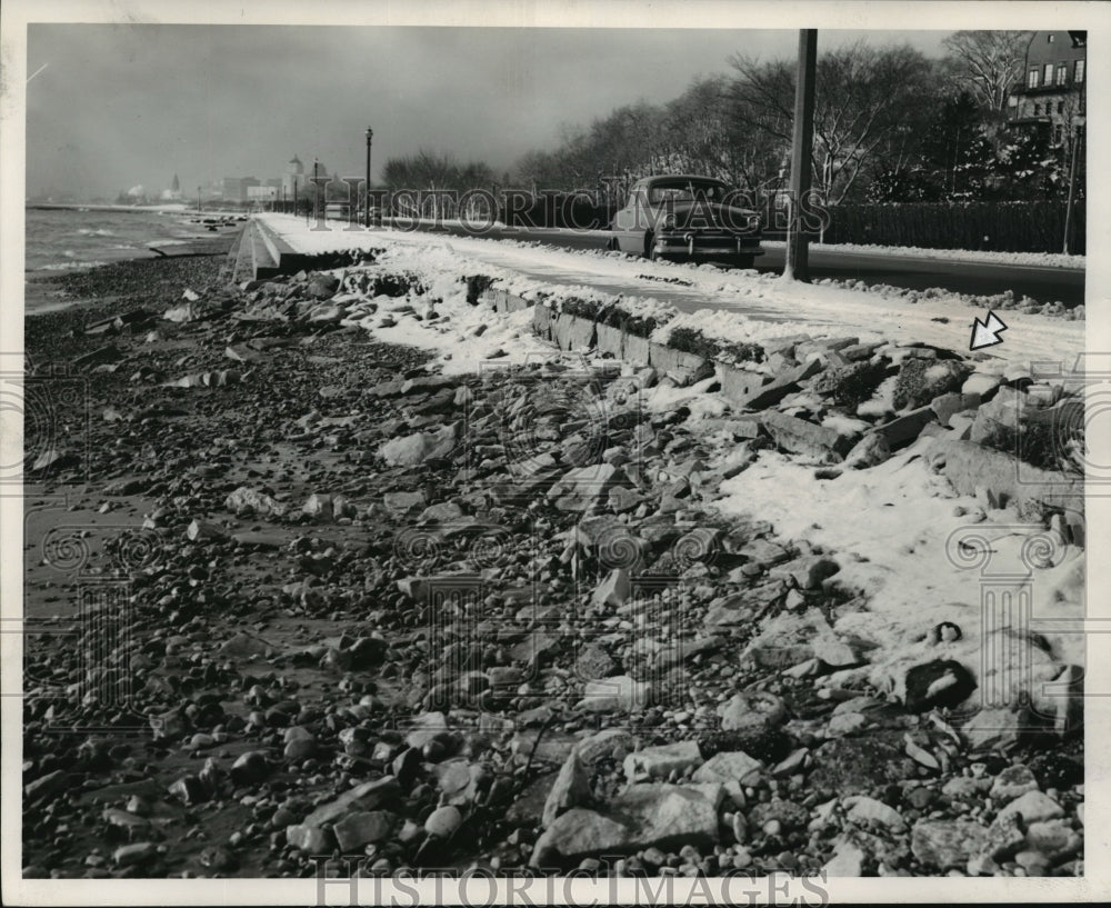 1951 Press Photo A portion of sidewalk eroded away by the waves at Lake Michigan-Historic Images