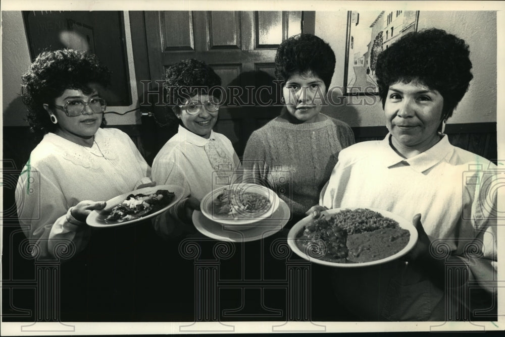 1988 Press Photo The four owners of the Atotonilco restaurant with food samples - Historic Images